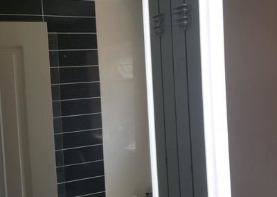 Bathroom cabinet with integral shaver socket 2